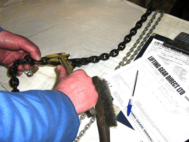 inspecting the hoist chain